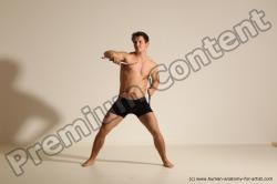 Underwear Fighting with axe Man White Muscular Short Brown Dynamic poses Academic